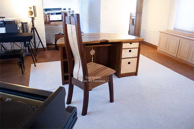 unique executive desk from different angle showing curve in slats in chair back